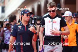 (L to R): Sergio Perez (MEX) Red Bull Racing with Nico Hulkenberg (GER) Haas F1 Team on the drivers' parade. 28.05.2023. Formula 1 World Championship, Rd 7, Monaco Grand Prix, Monte Carlo, Monaco, Race Day.