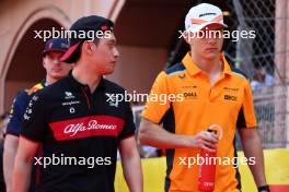 (L to R): Zhou Guanyu (CHN) Alfa Romeo F1 Team and Oscar Piastri (AUS) McLaren on the drivers' parade. 28.05.2023. Formula 1 World Championship, Rd 7, Monaco Grand Prix, Monte Carlo, Monaco, Race Day.
