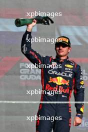 Race winner Max Verstappen (NLD) Red Bull Racing celebrates on the podium. 29.10.2023. Formula 1 World Championship, Rd 20, Mexican Grand Prix, Mexico City, Mexico, Race Day.