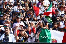 Circuit atmosphere - Sergio Perez (MEX) Red Bull Racing fans in the grandstand. 29.10.2023. Formula 1 World Championship, Rd 20, Mexican Grand Prix, Mexico City, Mexico, Race Day.