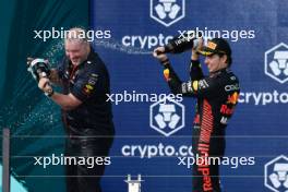 (L to R): Oliver Hughes (GBR) Red Bull Racing Chief Marketing Officer celebrates on the podium with second placed Sergio Perez (MEX) Red Bull Racing. 07.05.2023. Formula 1 World Championship, Rd 5, Miami Grand Prix, Miami, Florida, USA, Race Day.