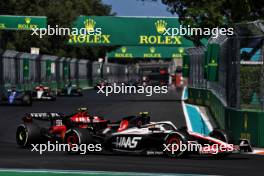 Nico Hulkenberg (GER) Haas VF-23 and Carlos Sainz Jr (ESP) Ferrari SF-23 battle for position. 07.05.2023. Formula 1 World Championship, Rd 5, Miami Grand Prix, Miami, Florida, USA, Race Day.