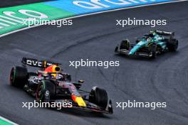Max Verstappen (NLD) Red Bull Racing RB19 leads Fernando Alonso (ESP) Aston Martin F1 Team AMR23. 27.08.2023. Formula 1 World Championship, Rd 14, Dutch Grand Prix, Zandvoort, Netherlands, Race Day.