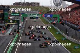 Max Verstappen (NLD) Red Bull Racing RB19 leads at the start of the race. 27.08.2023. Formula 1 World Championship, Rd 14, Dutch Grand Prix, Zandvoort, Netherlands, Race Day.