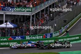 Esteban Ocon (FRA) Alpine F1 Team A523 and Lewis Hamilton (GBR) Mercedes AMG F1 W14. 27.08.2023. Formula 1 World Championship, Rd 14, Dutch Grand Prix, Zandvoort, Netherlands, Race Day.