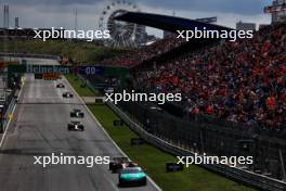 Max Verstappen (NLD) Red Bull Racing RB19 leads behind the Aston Martin FIA Safety Car. 27.08.2023. Formula 1 World Championship, Rd 14, Dutch Grand Prix, Zandvoort, Netherlands, Race Day.