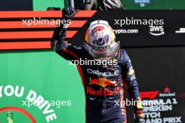 Max Verstappen (NLD) Red Bull Racing celebrates his pole position in qualifying parc ferme. 26.08.2023. Formula 1 World Championship, Rd 14, Dutch Grand Prix, Zandvoort, Netherlands, Qualifying Day.