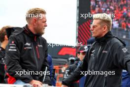 (L to R): Kevin Magnussen (DEN) Haas F1 Team with Nico Hulkenberg (GER) Haas F1 Team on the drivers' parade. 27.08.2023. Formula 1 World Championship, Rd 14, Dutch Grand Prix, Zandvoort, Netherlands, Race Day.