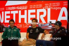 (L to R): Fernando Alonso (ESP) Aston Martin F1 Team; George Russell (GBR) Mercedes AMG F1; and Max Verstappen (NLD) Red Bull Racing, in the FIA Press Conference. 24.08.2023. Formula 1 World Championship, Rd 14, Dutch Grand Prix, Zandvoort, Netherlands, Preparation Day.