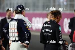 (L to R): Max Verstappen (NLD) Red Bull Racing with Lewis Hamilton (GBR) Mercedes AMG F1 on the drivers' parade. 08.10.2023. Formula 1 World Championship, Rd 18, Qatar Grand Prix, Doha, Qatar, Race Day.