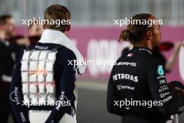 (L to R): Max Verstappen (NLD) Red Bull Racing with Lewis Hamilton (GBR) Mercedes AMG F1 on the drivers' parade. 08.10.2023. Formula 1 World Championship, Rd 18, Qatar Grand Prix, Doha, Qatar, Race Day.