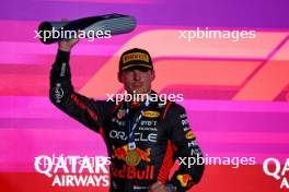 Race winner Max Verstappen (NLD) Red Bull Racing celebrates on the podium. 08.10.2023. Formula 1 World Championship, Rd 18, Qatar Grand Prix, Doha, Qatar, Race Day.