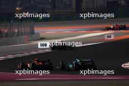 Lance Stroll (CDN) Aston Martin F1 Team AMR23 and Oscar Piastri (AUS) McLaren MCL60 battle for position. 08.10.2023. Formula 1 World Championship, Rd 18, Qatar Grand Prix, Doha, Qatar, Race Day.