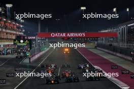 Max Verstappen (NLD) Red Bull Racing RB19 leads at the start of the race. 08.10.2023. Formula 1 World Championship, Rd 18, Qatar Grand Prix, Doha, Qatar, Race Day.