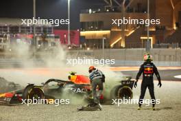 Sergio Perez (MEX) Red Bull Racing RB19 and Esteban Ocon (FRA) Alpine F1 Team A523 crashed out of the race. 07.10.2023. Formula 1 World Championship, Rd 18, Qatar Grand Prix, Doha, Qatar, Sprint Day.