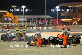 Esteban Ocon (FRA) Alpine F1 Team A523 and Sergio Perez (MEX) Red Bull Racing RB19 crashed out of the race. 07.10.2023. Formula 1 World Championship, Rd 18, Qatar Grand Prix, Doha, Qatar, Sprint Day.