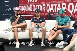 (L to R): Pierre Gasly (FRA) Alpine F1 Team; Sergio Perez (MEX) Red Bull Racing; and Fernando Alonso (ESP) Aston Martin F1 Team, in the FIA Press Conference. 05.10.2023. Formula 1 World Championship, Rd 18, Qatar Grand Prix, Doha, Qatar, Preparation Day.
