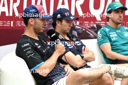 (L to R): Pierre Gasly (FRA) Alpine F1 Team and Sergio Perez (MEX) Red Bull Racing in the FIA Press Conference. 05.10.2023. Formula 1 World Championship, Rd 18, Qatar Grand Prix, Doha, Qatar, Preparation Day.