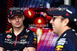 Max Verstappen (NLD) Red Bull Racing and team mate Sergio Perez (MEX) Red Bull Racing. 19.03.2023. Formula 1 World Championship, Rd 2, Saudi Arabian Grand Prix, Jeddah, Saudi Arabia, Race Day.