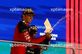 Race winner Carlos Sainz Jr (ESP) Ferrari celebrates on the podium. 17.09.2023. Formula 1 World Championship, Rd 16, Singapore Grand Prix, Marina Bay Street Circuit, Singapore, Race Day.