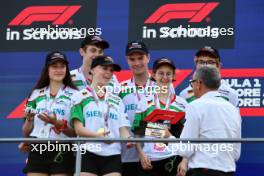 Winners Germany celebrate on the F1 in Schools World Finals podium with Stefano Domenicali (ITA) Formula One President and CEO. 16.09.2023. Formula 1 World Championship, Rd 16, Singapore Grand Prix, Marina Bay Street Circuit, Singapore, Qualifying Day.