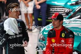 (L to R): Second placed George Russell (GBR) Mercedes AMG F1 with third placed Charles Leclerc (MON) Ferrari in qualifying parc ferme. 16.09.2023. Formula 1 World Championship, Rd 16, Singapore Grand Prix, Marina Bay Street Circuit, Singapore, Qualifying Day.