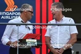 (L to R): Stefano Domenicali (ITA) Formula One President and CEO on the F1 in Schools World Finals podium with Andrew Denton (GBR) F1 In Schools. 16.09.2023. Formula 1 World Championship, Rd 16, Singapore Grand Prix, Marina Bay Street Circuit, Singapore, Qualifying Day.