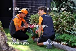 (L to R): Lando Norris (GBR) McLaren with team mate Oscar Piastri (AUS) McLaren. 14.09.2023. Formula 1 World Championship, Rd 16, Singapore Grand Prix, Marina Bay Street Circuit, Singapore, Preparation Day.