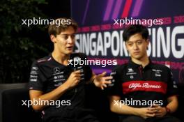 (L to R): George Russell (GBR) Mercedes AMG F1 and Zhou Guanyu (CHN) Alfa Romeo F1 Team in the FIA Press Conference.  14.09.2023. Formula 1 World Championship, Rd 16, Singapore Grand Prix, Marina Bay Street Circuit, Singapore, Preparation Day.