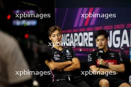 (L to R): George Russell (GBR) Mercedes AMG F1 and Zhou Guanyu (CHN) Alfa Romeo F1 Team in the FIA Press Conference. 14.09.2023. Formula 1 World Championship, Rd 16, Singapore Grand Prix, Marina Bay Street Circuit, Singapore, Preparation Day.