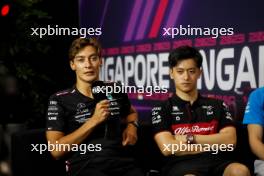 (L to R): George Russell (GBR) Mercedes AMG F1 and Zhou Guanyu (CHN) Alfa Romeo F1 Team in the FIA Press Conference. 14.09.2023. Formula 1 World Championship, Rd 16, Singapore Grand Prix, Marina Bay Street Circuit, Singapore, Preparation Day.