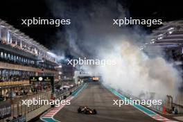 Race winner Max Verstappen (NLD) Red Bull Racing RB19 at the end of the race. 26.11.2023. Formula 1 World Championship, Rd 23, Abu Dhabi Grand Prix, Yas Marina Circuit, Abu Dhabi, Race Day.