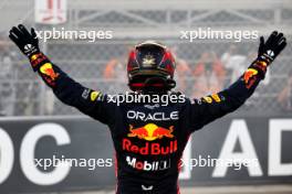 Race winner Max Verstappen (NLD) Red Bull Racing celebrates at the end of the race in parc ferme. 26.11.2023. Formula 1 World Championship, Rd 23, Abu Dhabi Grand Prix, Yas Marina Circuit, Abu Dhabi, Race Day.