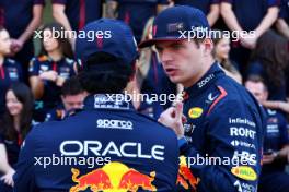 Max Verstappen (NLD) Red Bull Racing and Sergio Perez (MEX) Red Bull Racing at a team photograph. 26.11.2023. Formula 1 World Championship, Rd 23, Abu Dhabi Grand Prix, Yas Marina Circuit, Abu Dhabi, Race Day.