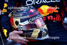 The helmet of Max Verstappen (NLD) Red Bull Racing at a team photograph. 26.11.2023. Formula 1 World Championship, Rd 23, Abu Dhabi Grand Prix, Yas Marina Circuit, Abu Dhabi, Race Day.