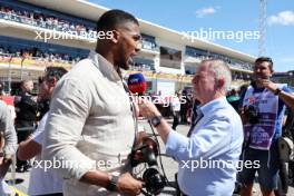(L to R): Anthony Joshua (GBR) Boxer and Otro Capital Alpine F1 Team Investor with Martin Brundle (GBR) Sky Sports Commentator on the grid. 22.10.2023. Formula 1 World Championship, Rd 19, United States Grand Prix, Austin, Texas, USA, Race Day.