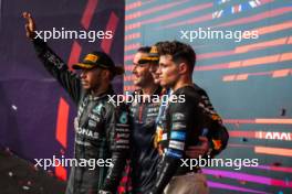The podium (L to R): Lewis Hamilton (GBR) Mercedes AMG F1, second; John Hammond (GBR) Red Bull Racing Physiotherapist; Max Verstappen (NLD) Red Bull Racing, race winner; Lando Norris (GBR) McLaren, third. 22.10.2023. Formula 1 World Championship, Rd 19, United States Grand Prix, Austin, Texas, USA, Race Day.