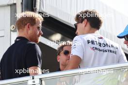 (L to R): Prince Harry (GBR) Duke of Sussex with George Russell (GBR) Mercedes AMG F1. 22.10.2023. Formula 1 World Championship, Rd 19, United States Grand Prix, Austin, Texas, USA, Race Day.