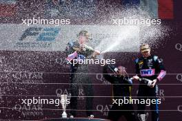 (L to R): Race winner Jack Doohan (AUS) Virtuosi Racing celebrates on the podium with third placed Victor Martins (FRA) ART Grand Prix. 23.07.2023. FIA Formula 2 Championship, Rd 10, Budapest, Hungary, Feature Race, Sunday.