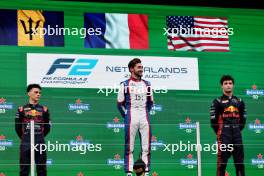 The podium (L to R): Zane Maloney (BRB) Rodin Carlin, race winner; Clement Novalak (FRA) Trident, race winner; Jak Crawford (USA) Hitech Pule-Eight, third. 27.08.2023. FIA Formula 2 Championship, Rd 12, Feature Race, Zandvoort, Netherlands, Sunday.