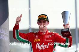 Frederik Vesti (DEN) Prema Racing celebrates his third position on the podium. 26.11.2023. Formula 2 Championship, Rd 14, Yas Marina Circuit, Abu Dhabi, UAE, Feature Race, Sunday.