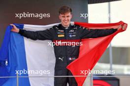 Theo Pourchaire (FRA) ART Grand Prix celebrates winning the F2 Championship on the podium. 26.11.2023. Formula 2 Championship, Rd 14, Yas Marina Circuit, Abu Dhabi, UAE, Feature Race, Sunday.