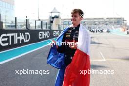 Theo Pourchaire (FRA) ART Grand Prix celebrates winning the F2 Championship in parc ferme. 26.11.2023. Formula 2 Championship, Rd 14, Yas Marina Circuit, Abu Dhabi, UAE, Feature Race, Sunday.