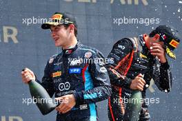 (L to R): second placed Franco Colapinto (ARG) MP Motorsport and third placed Caio Collet (BRA) Van Amersfoort Racing celebrate on the podium. 04.03.2023. FIA Formula 3 Championship, Rd 1, Sprint Race, Sakhir, Bahrain, Saturday.