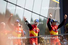 (L to R): Race winners Antonio Giovinazzi (ITA), James Calado (GBR), and Alessandro Pier Guidi (ITA) #51 AF Corse Ferrari, celebrate on the podium. 11.06.2023. FIA World Endurance Championship, Le Mans 24 Hours Race, Le Mans, France, Sunday.