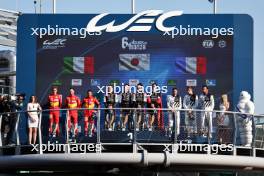 The podium Mike Conway (GBR) / Kamui Kobayashi (JPN) / Jose Maria Lopez (ARG) #07 Toyota Gazoo Racing, race winners; Antonio Fuoco (ITA) / Miguel Molina (ESP) / Nicklas Nielsen (DEN) #50 Ferrari AF Corse, second; Paul di Resta (GBR) / Mikkel Jensen (DEN) / Jean-Eric Vergne (FRA) #93 Peugeot, third. 09.07.2023. FIA World Endurance Championship, Rd 5, Six Hours Of Monza, Monza, Italy.