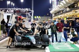 Mercedes AMG F1 W15 of George Russell (GBR) pushed down the pit lane by mechanics. 28.02.2024. Formula 1 World Championship, Rd 1, Bahrain Grand Prix, Sakhir, Bahrain, Preparation Day.