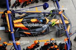 Oscar Piastri (AUS) McLaren MCL38 makes a pit stop. 21.04.2024. Formula 1 World Championship, Rd 5, Chinese Grand Prix, Shanghai, China, Race Day.