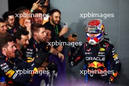 Race winner Max Verstappen (NLD) Red Bull Racing celebrates with the team in parc ferme. 09.03.2024. Formula 1 World Championship, Rd 2, Saudi Arabian Grand Prix, Jeddah, Saudi Arabia, Race Day.